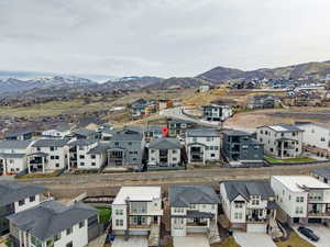 Aerial view of the neighborhood and views or the Great Salt Lake, Mtns, and valley.  Secluded area.