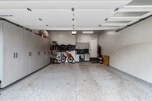 Custom Built out garage. Work Bench. Deep storage closets. Bike storage system. Epoxied Floors.