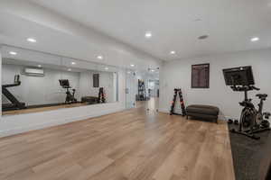 Expansive Gym Room in the basement. Can lights. Large mirrors. Could be turned into a 4th bedroom again pretty easily! Access to 'good sized' under the porch storage.