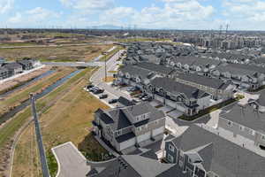Aerial overview of property's location featuring nearby suburban area