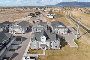 Aerial view of residential area with mountains