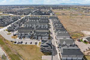 Aerial view of property's location with nearby suburban area