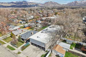 Aerial perspective of suburban area with a mountain backdrop
