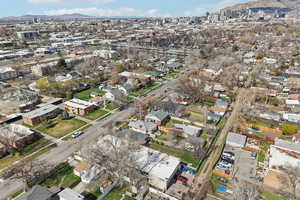Aerial view of property's location featuring a mountain backdrop