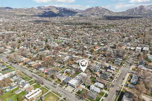 Aerial view of residential area with a mountainous background