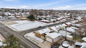 Snowy aerial view with a residential view
