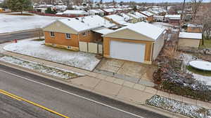 Snowy aerial view with a residential view