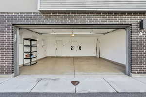Garage featuring baseboards