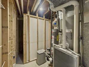 Utilities featuring gas water heater and heating unit