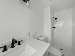 Full bathroom with a stall shower and vanity