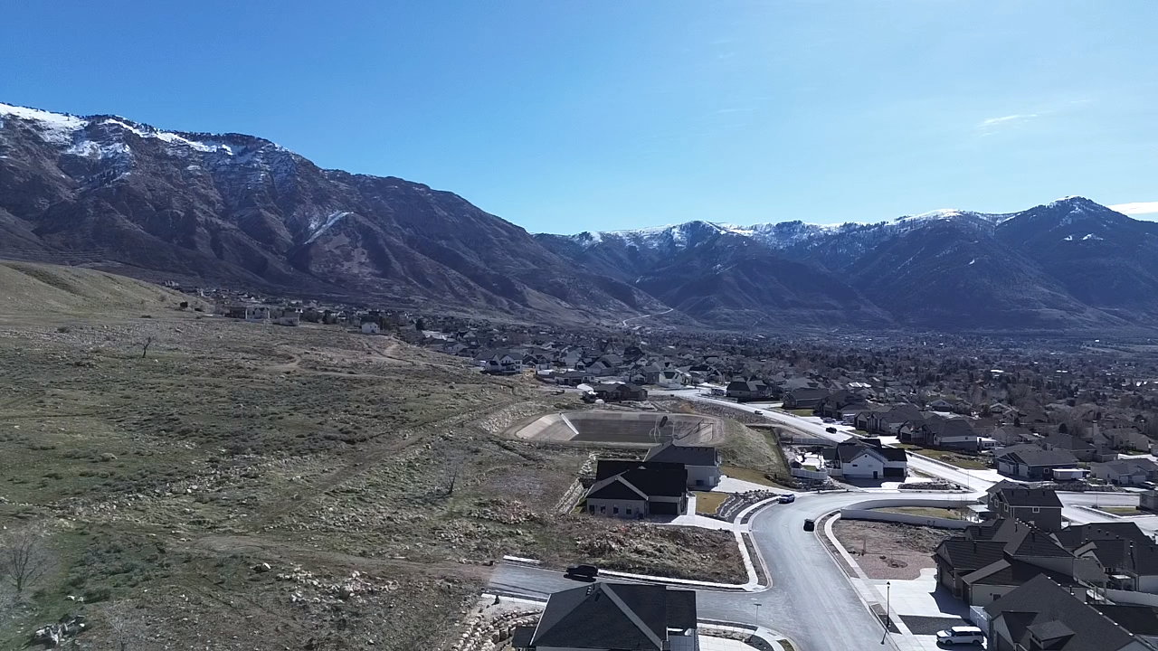 Mountain view featuring nearby suburban area