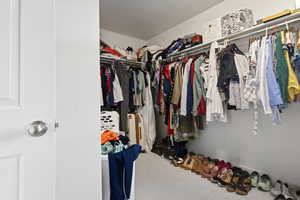 View of master walk in closet