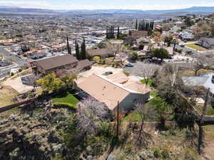 Aerial perspective of suburban area featuring a mountainous background