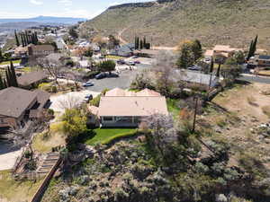 Aerial view of residential area featuring mountains