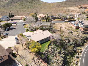 Aerial view of residential area featuring a mountain backdrop
