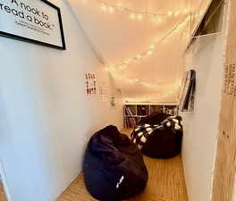 Hall with light wood-style flooring