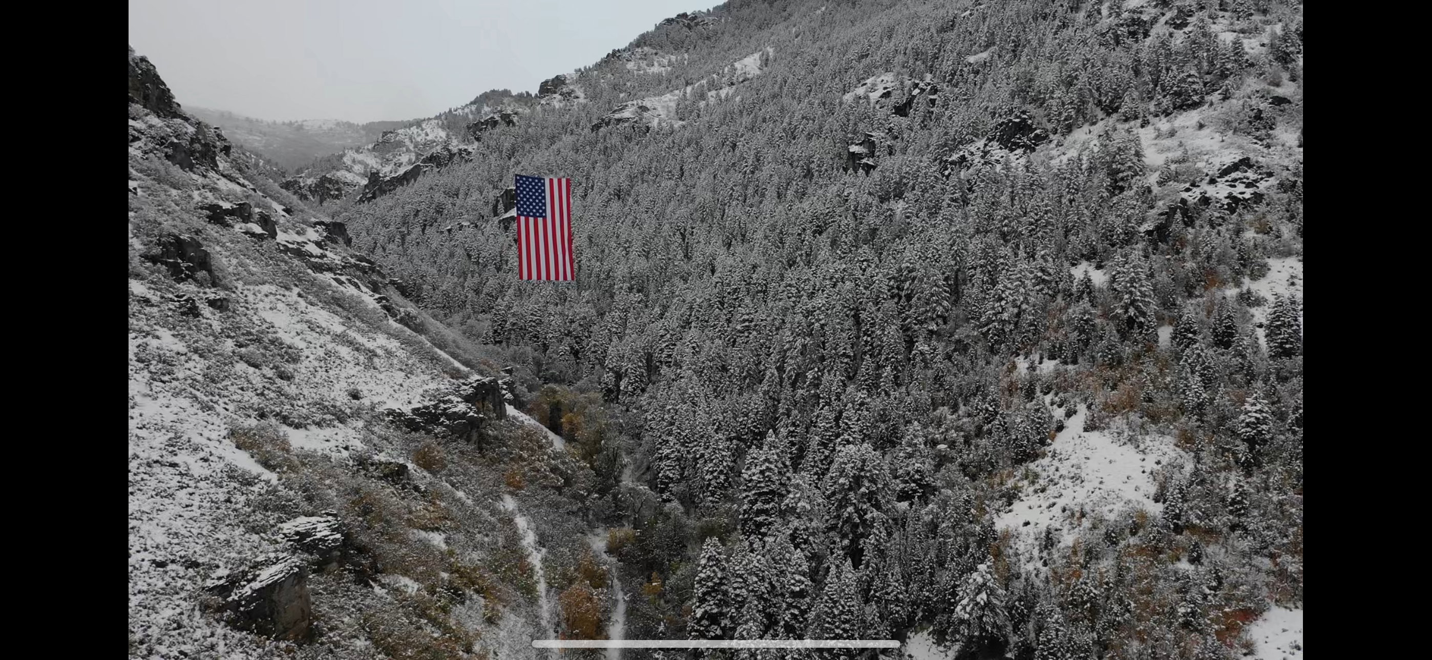 Exterior view of a mountainous background and a heavily wooded area