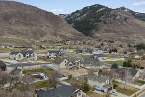 View of mountain background featuring nearby suburban area
