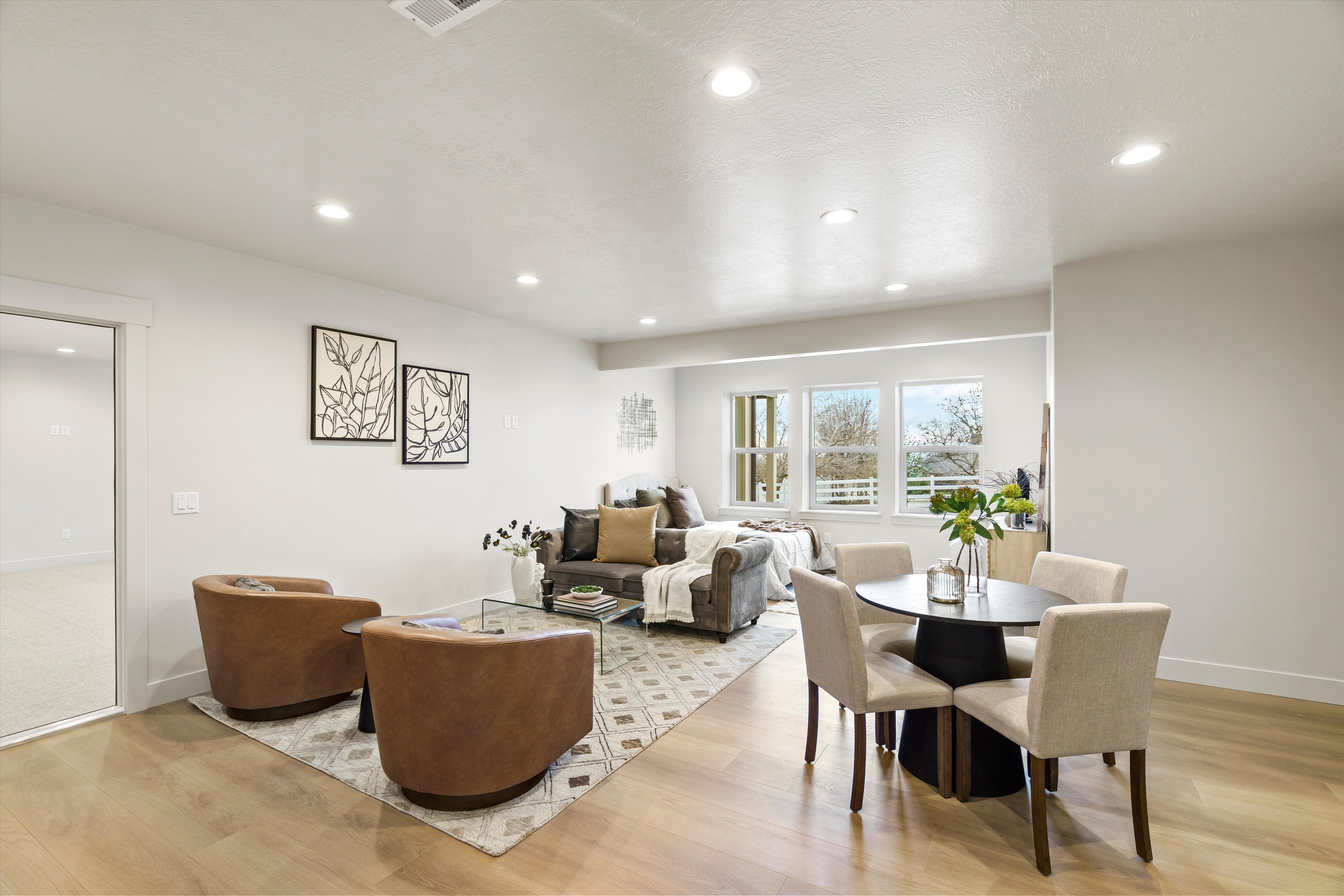 Dining room featuring light wood-style flooring and recessed lighting