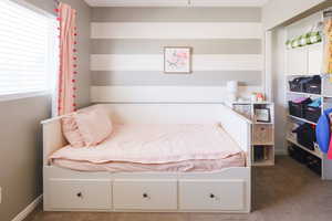 Bedroom with carpet flooring