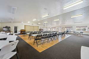 Dining area featuring light carpet and light wood-style floors