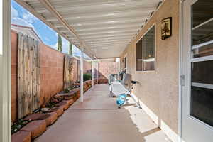 Fenced backyard featuring a patio