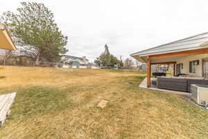 Fenced backyard with ample outdoor furniture space , mountain views, cool east face summer evenings.