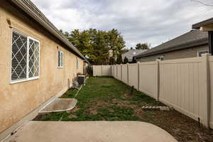 View of fenced backyard
