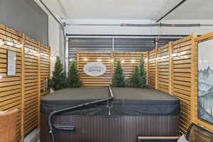 Wooden deck with a hot tub