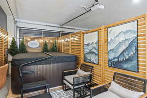 Interior space featuring a hot tub