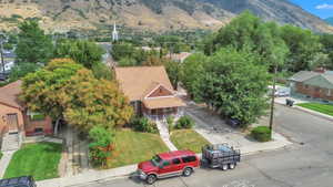 Aerial perspective of suburban area with a mountain backdrop