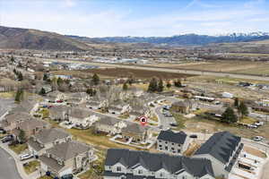 Aerial view of residential area featuring mountains