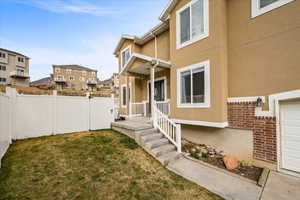View of yard featuring a residential view and a porch