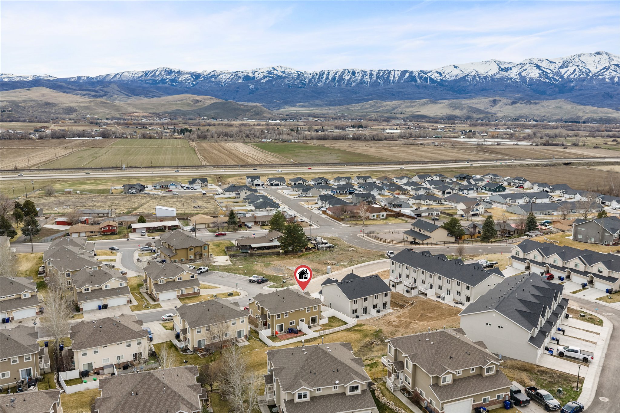 Aerial perspective of suburban area with mountains