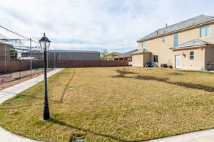 View of fenced backyard