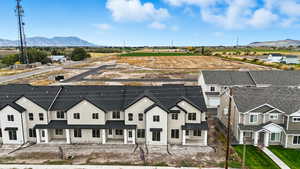 View of front of house featuring a mountain view and stucco siding