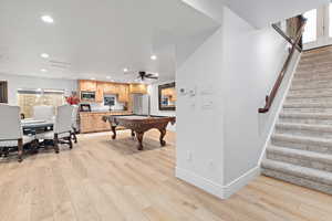 Recreation room with pool table, recessed lighting, plenty of natural light, light wood-style floors, and a ceiling fan