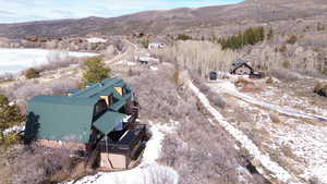 Snowy aerial view with a mountain view