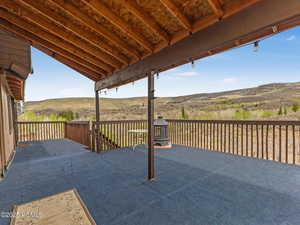 Wooden terrace with a patio