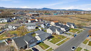 Aerial view of residential area with a mountain backdrop