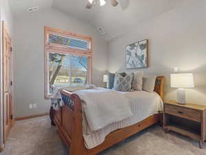 Bedroom featuring light colored carpet and ceiling fan