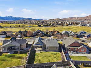 Aerial view of residential area featuring a mountain backdrop