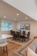 Dining space featuring light wood-style floors and recessed lighting