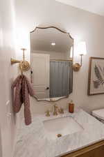 Full bath featuring vanity, a shower with shower curtain, and recessed lighting