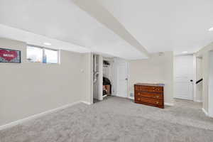Basement featuring light carpet and recessed lighting