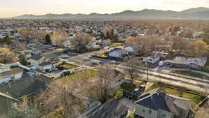 Aerial view at dusk of a residential view and a mountain view