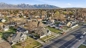 Aerial view of residential area featuring a mountain backdrop