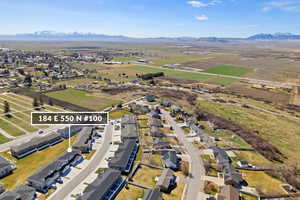 Aerial view of residential area with a mountainous background
