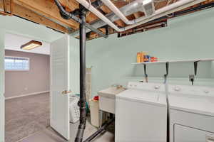 Laundry area with separate washer and dryer