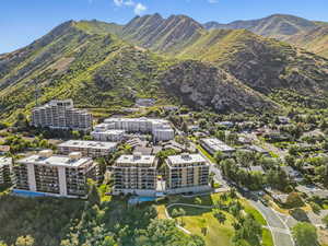 Bird's eye view of mountains and apartment complex / building